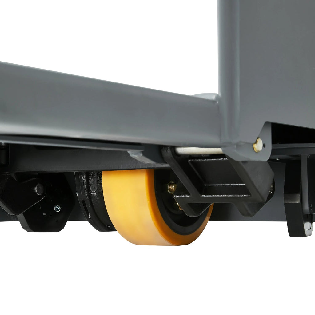 Electric pallet jack close-up of gray frame and yellow wheels under forks