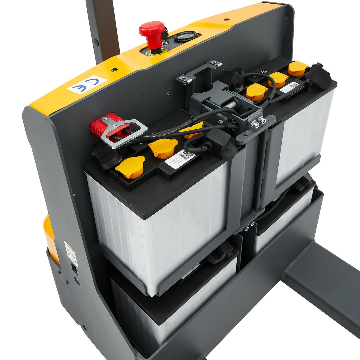 Electric pallet jack control console with red button and black levers on yellow top