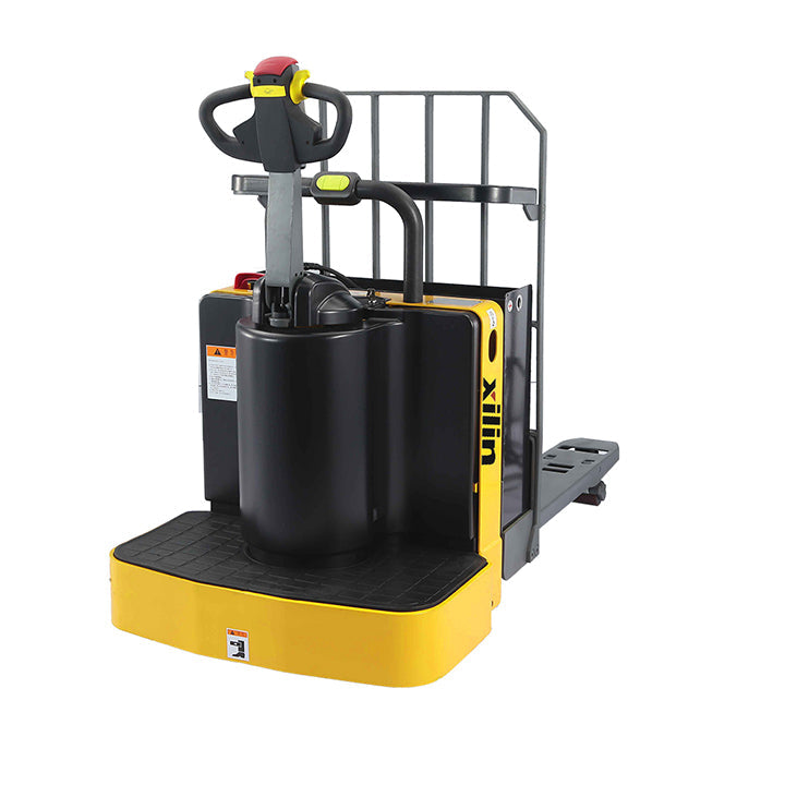 Electric pallet jack front view with black battery housing, yellow deck, and lift mast