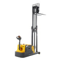 Yellow electric counterbalanced stacker with raised mast and fork tines