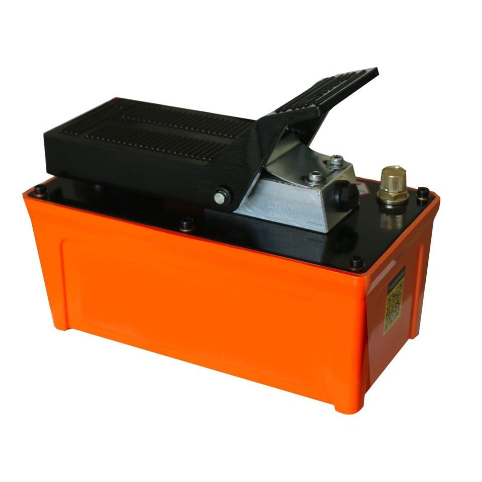 Auto body frame machine hydraulic power unit with orange housing and black top