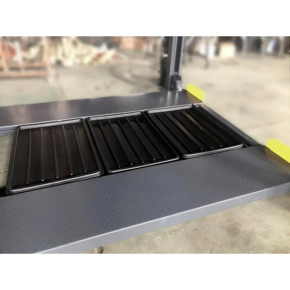 13. 8,500 lb 4-post lift with casters for easy repositioning