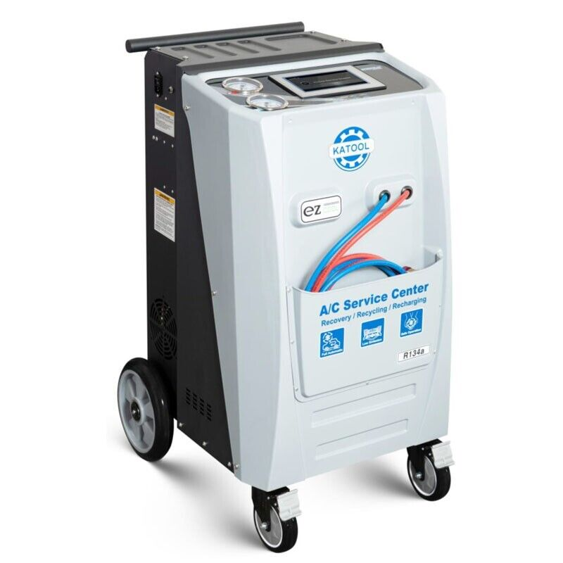 A/C refrigerant recovery machine on caster wheels with front control panel and hoses