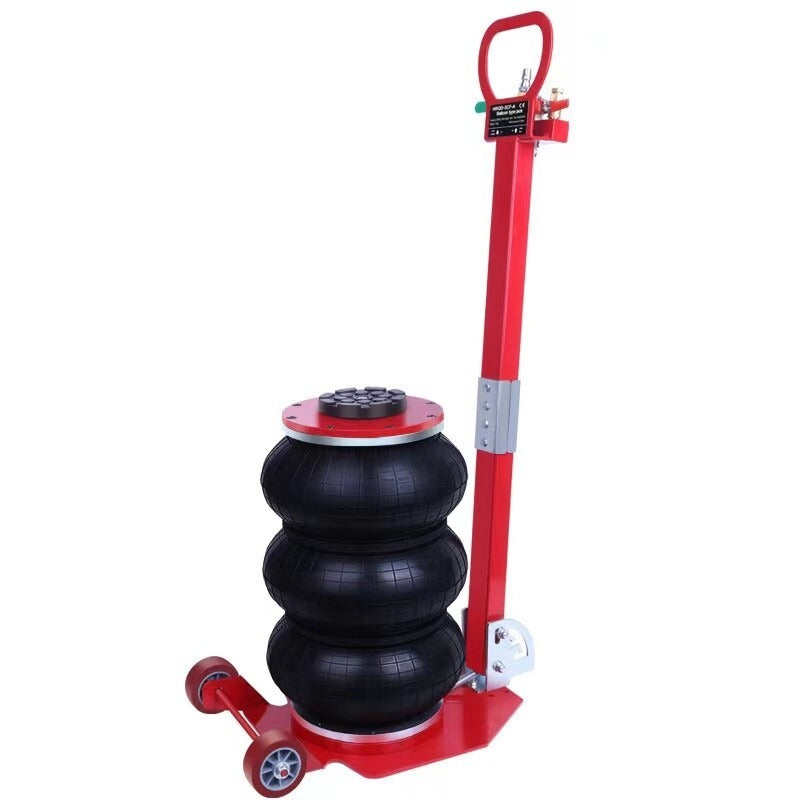 Red triple air bag pneumatic jack with black pads and lifting handle