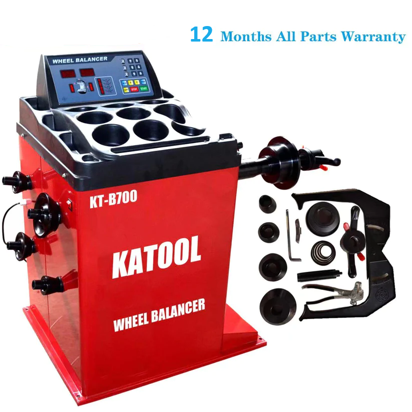 Wheel balancer machine with accessory kit, red housing and black control panel