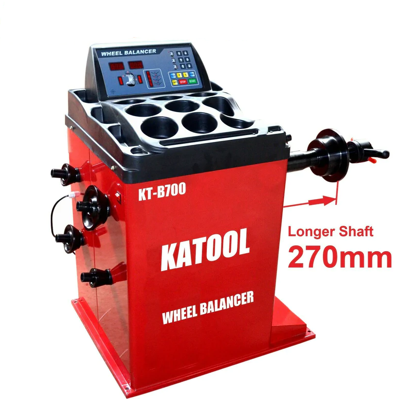 Wheel balancer machine with side clamps and spindle, black controller and red base