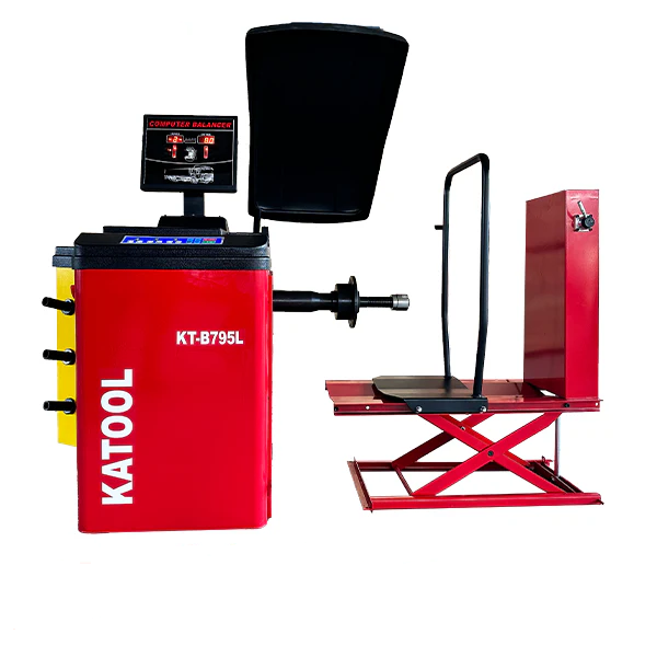Red wheel balancer machine with control screen, axle shaft, and mounting stand