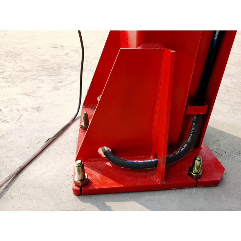 Red lift base with black cable cover and coil springs on steel mounting plate