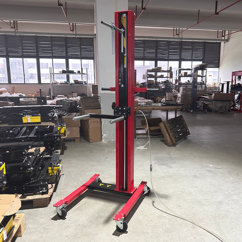 Red tire lift stand with vertical post and caster base