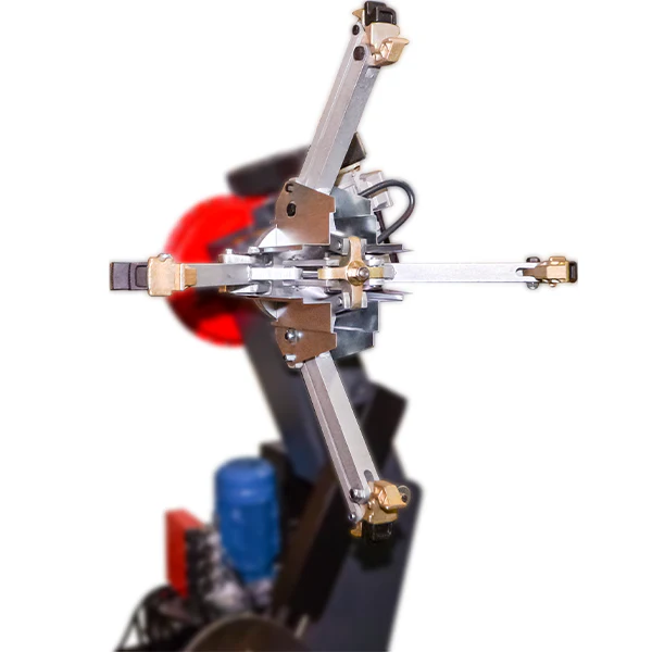 Tire changer bead tool head with silver arms and gold clamp components on black support