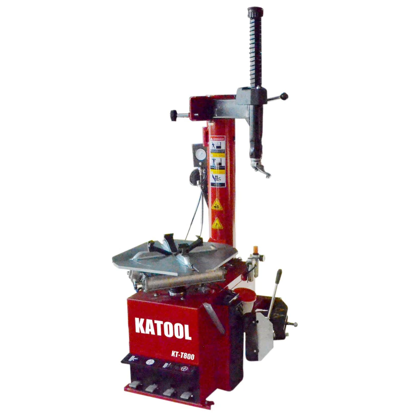 Benchtop tire changer with red base and vertical bead-breaking column