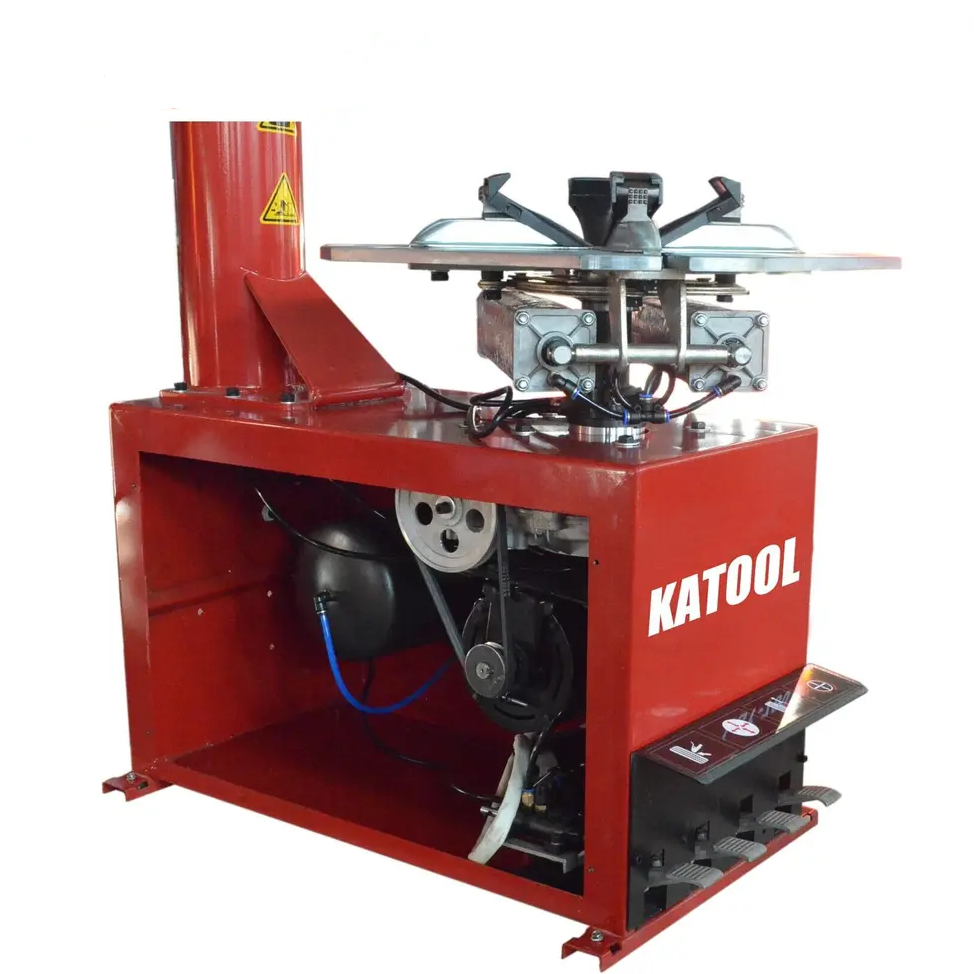 Wheel clamp tire changer with red housing and metal mounting head