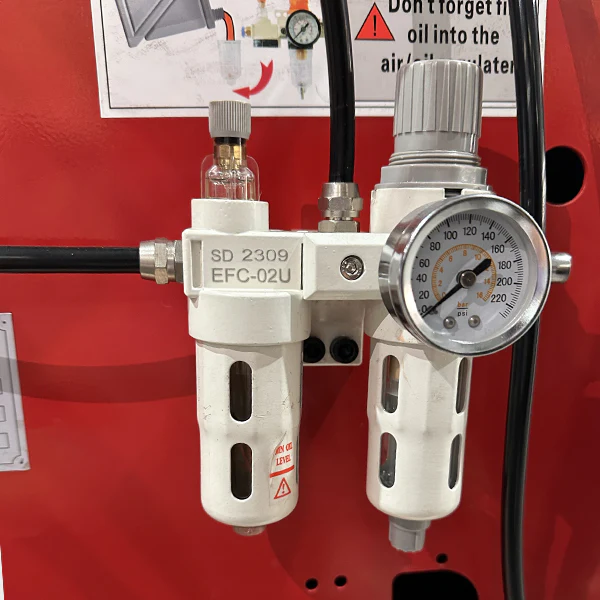 10. Premium tire changer showing bead blaster operation