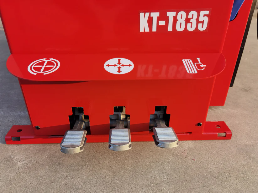 KT-T835 tire changer front panel with three silver foot pedals