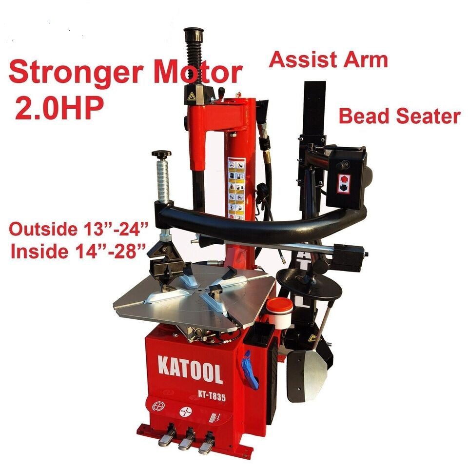 Red double-arm tire changer with bead seater and assist arm