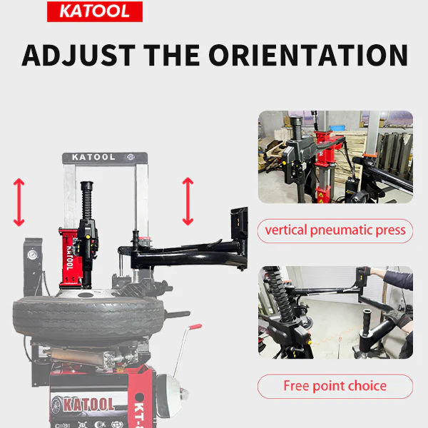 Vertical pneumatic press with tire on platform and adjustable overhead post, side view.