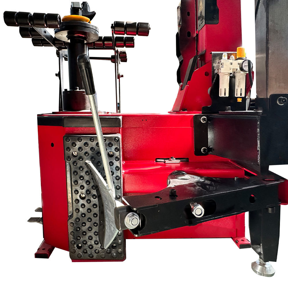 Tire changer tool arm and mounting platform with red frame and metal foot pegs