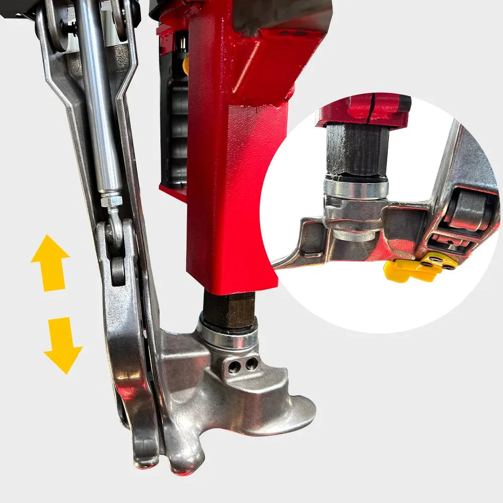 Tire changer bead breaker linkage with yellow latch and silver metal lever
