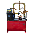 Wheel straightener and lathe machine with central clamp and blue control unit