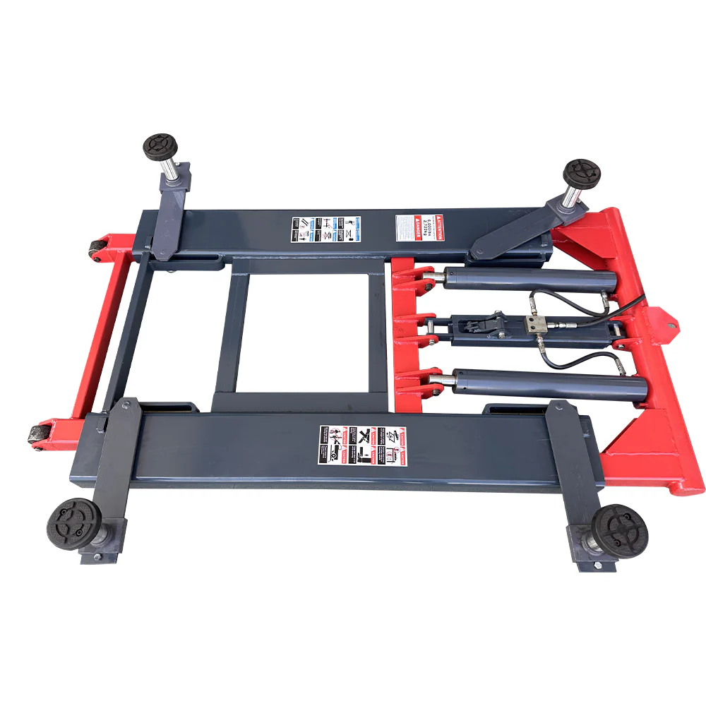 Complete scissor lift with four caster feet, black base, and red frame rails