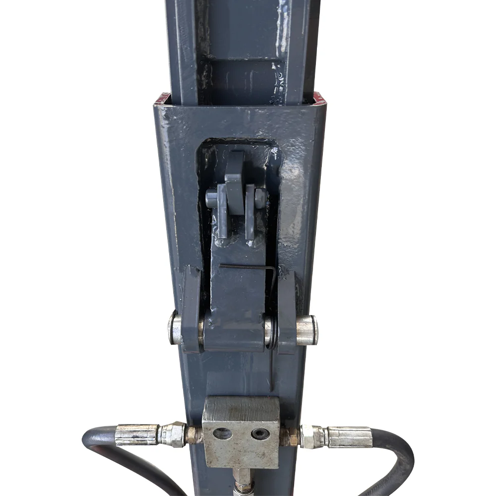Close-up of hydraulic actuator and guide bracket on the scissor lift post