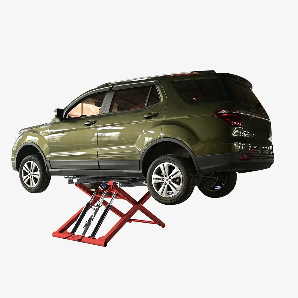 Portable scissor car lift with red frame and raised platform under an olive SUV