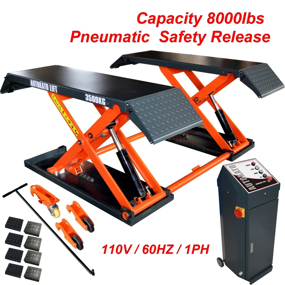 Pneumatic scissor lift with dark textured platform, orange frame, and control box