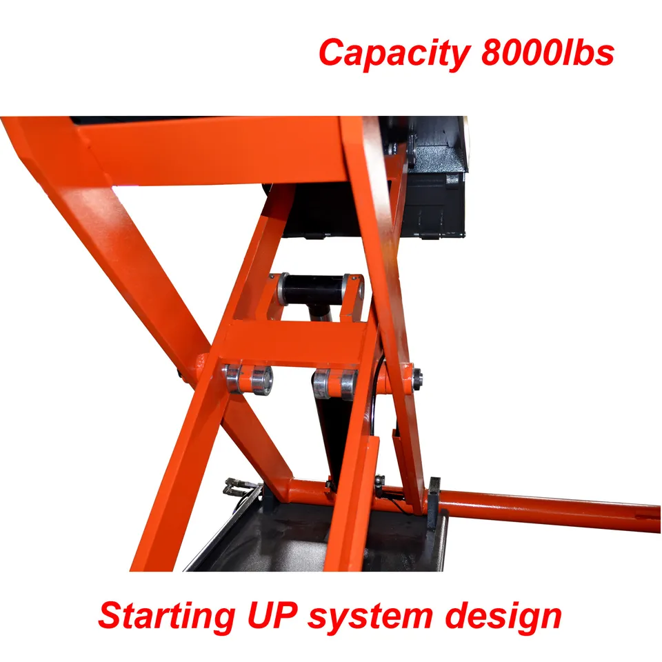 Pneumatic scissor lift underside with orange linkage and dark hydraulic components