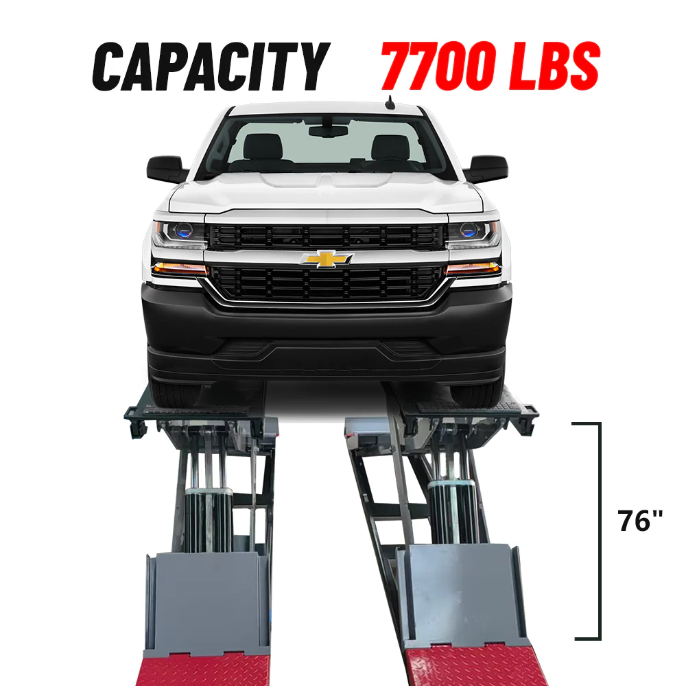 Full-rise scissor lift, white cab front with 7700 lb capacity label and raised platform