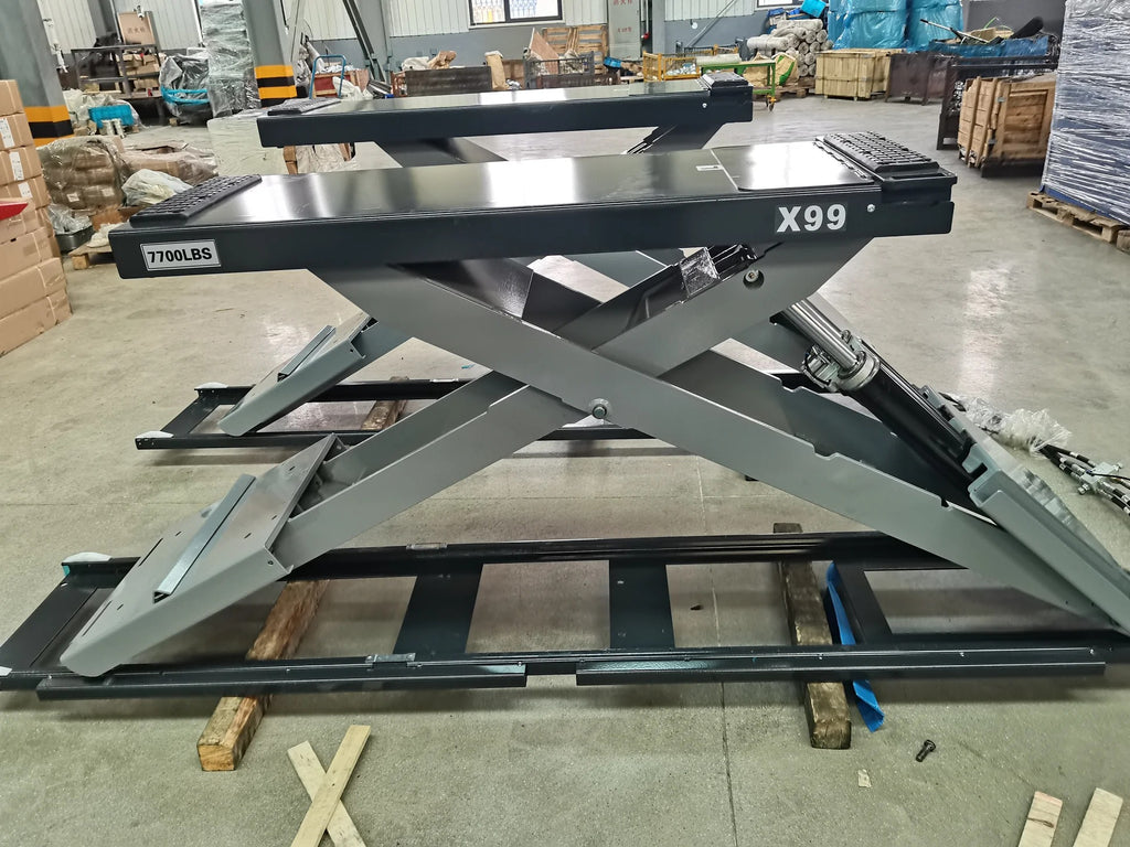 Full-rise scissor lift with gray scissor arms, X99 beam, and red load pads