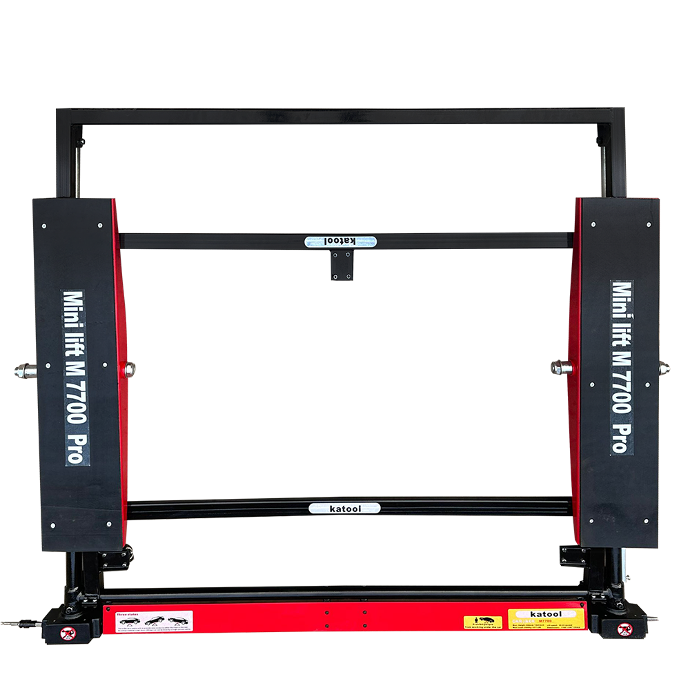 Portable tilting floor car jack with red base and black lift frame, side plates