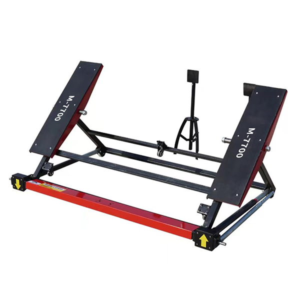 Portable floor car jack with two black lift plates, red base beam, and support legs