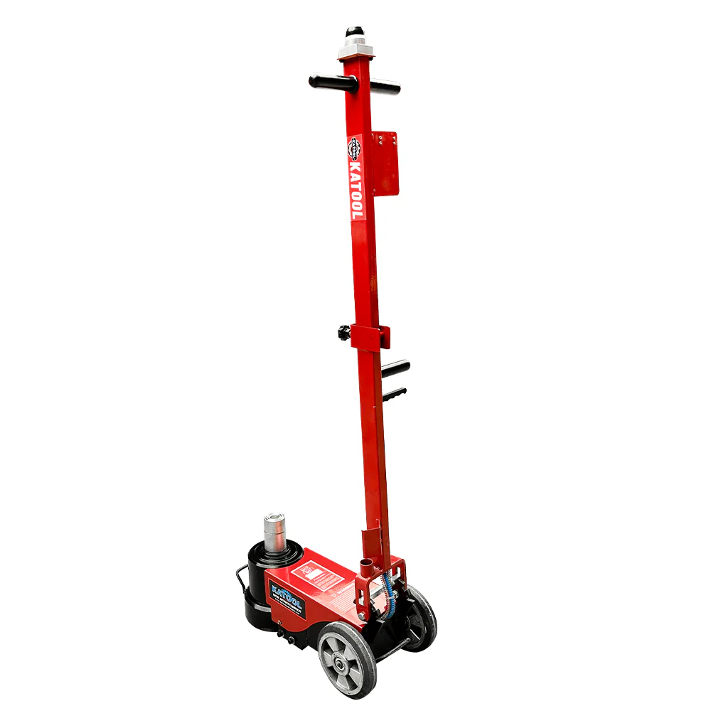 Red pneumatic hydraulic jack with black base wheels and extended vertical lift post