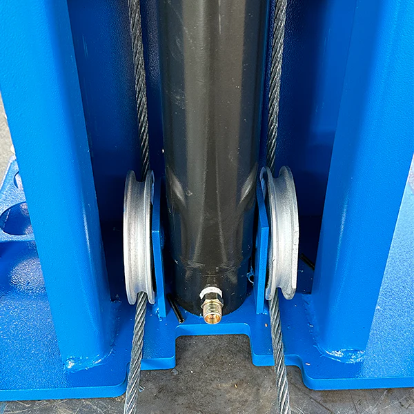 8. Two-post vehicle lift showing hydraulic power unit