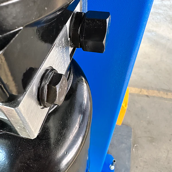 Car lift safety latch and steel guide plate beside blue column