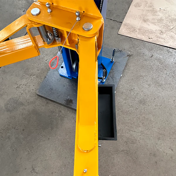 Yellow lift support arm with black base tray and adjustment hardware
