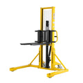 Manual pallet stacker with yellow frame, black lift forks and control column