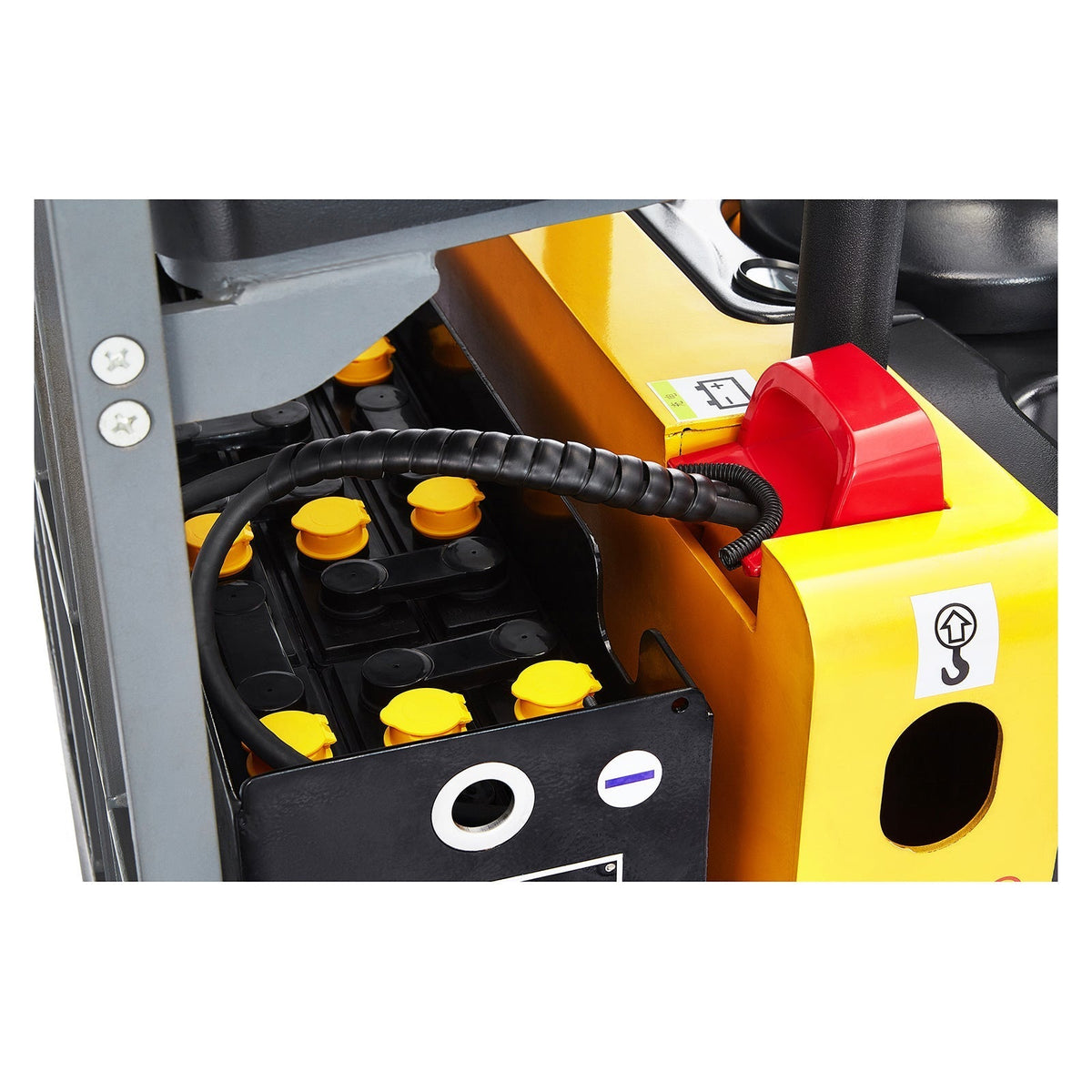 Close-up of pallet jack control panel with yellow caps and red emergency button