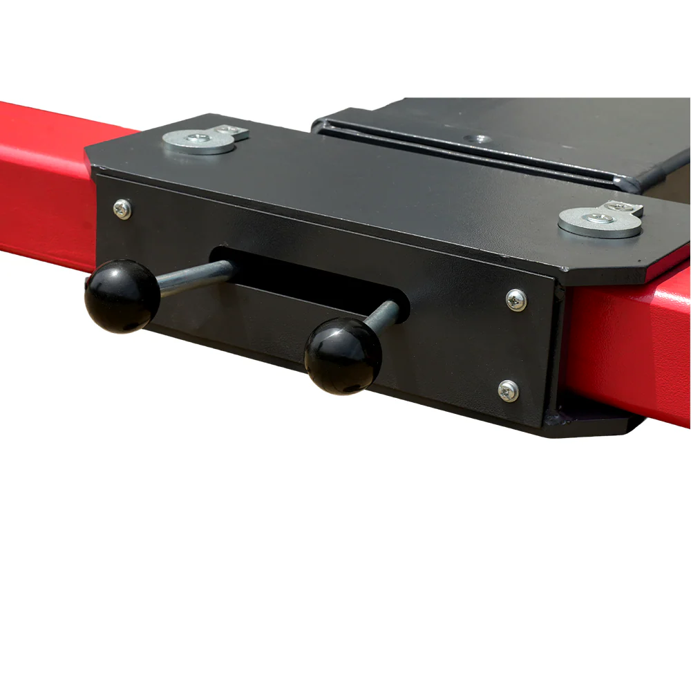 Vehicle lift base plate with red side rails and black lifting handle bars