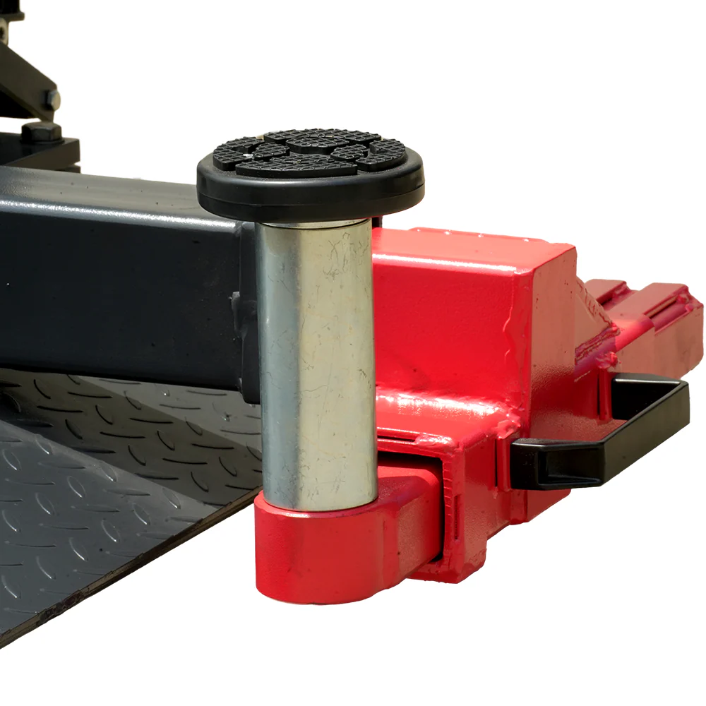 Vehicle lift lifting pad with black rubber top on red-and-black arm