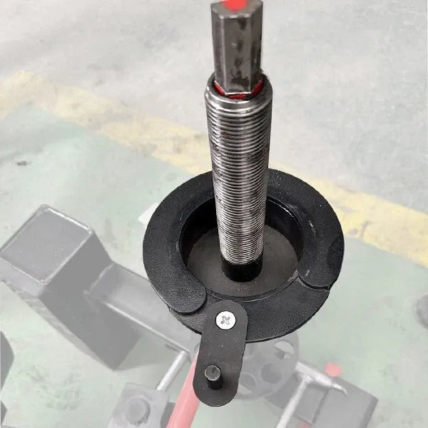 Mini portable tire changer tool with black base and threaded screw post