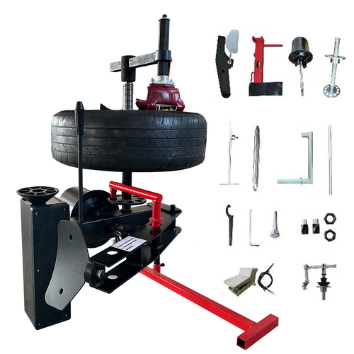 Mini portable tire changer with tire on turntable and accessory tools laid out