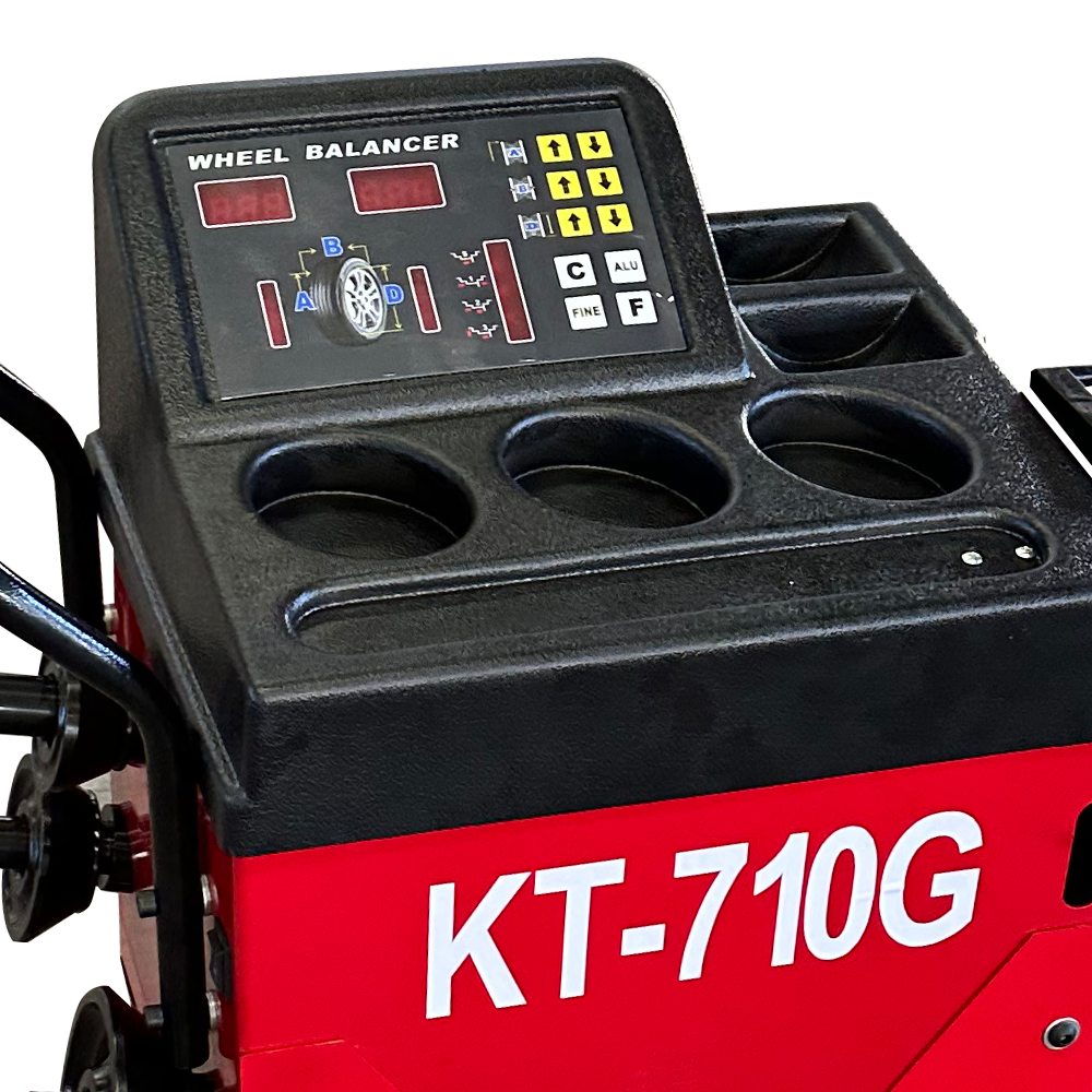 3. 710G wheel balancer showing 154 lbs weight capacity