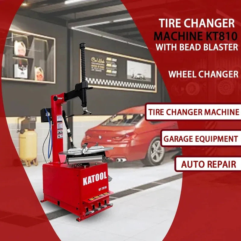 Red tire changer machine with vertical column and mounting platform in a garage scene