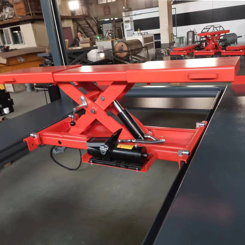 Red rolling jack with hydraulic lift base and black control pump
