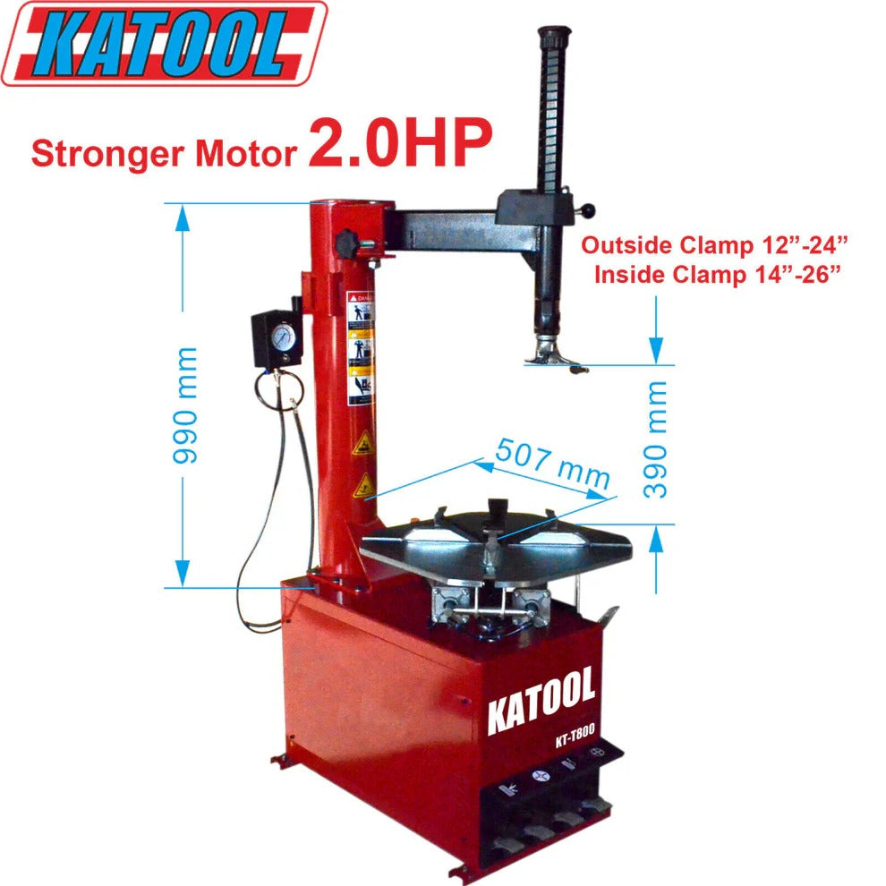 Red tire changer with vertical post and round wheel mounting turntable