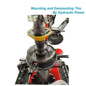 Katool tire changer mounting spindle with wheel and cone accessories