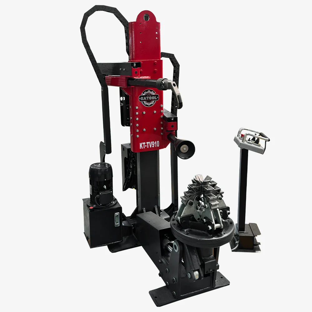 Hydraulic tire changer with red upright column, black base, and tool head assembly