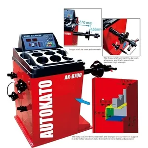 Katool wheel balancer with 270 mm shaft, red housing and wheel holder plate