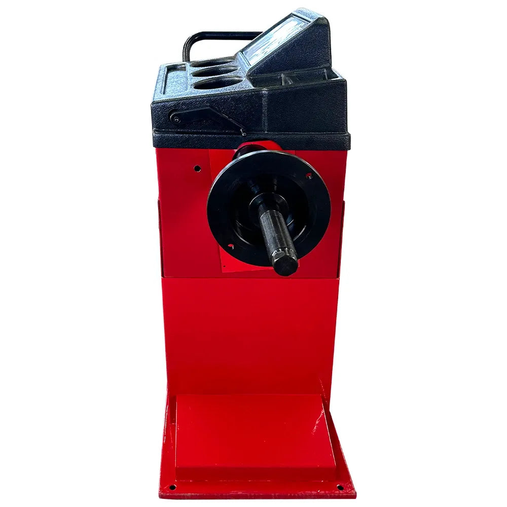 Wheel balancer front view with red housing and black circular spindle hub cover
